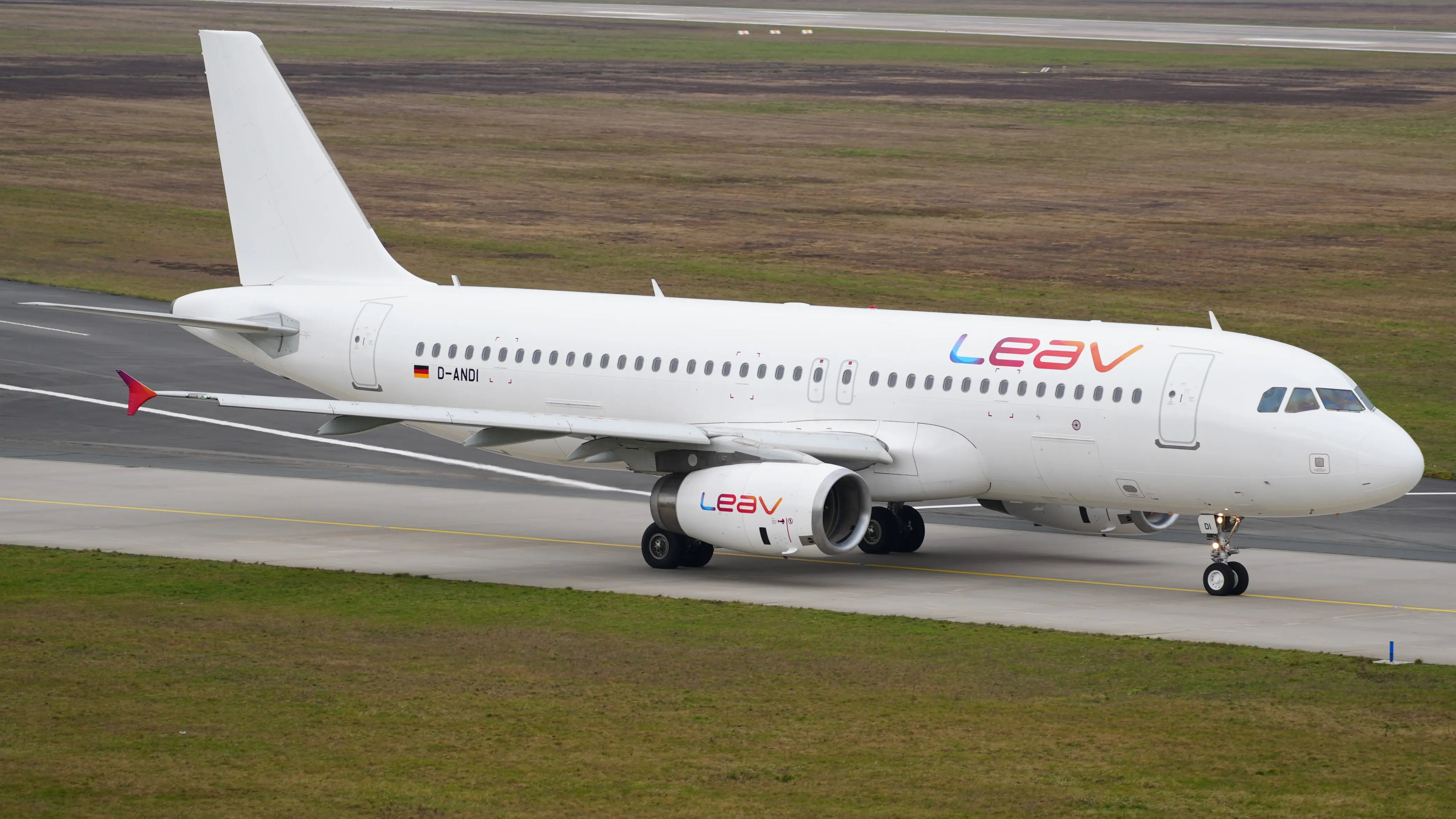 LEAV Aviation Airbus A320-232 aircraft with registration D-ANDI taxiing on a runway at Hannover Airport.